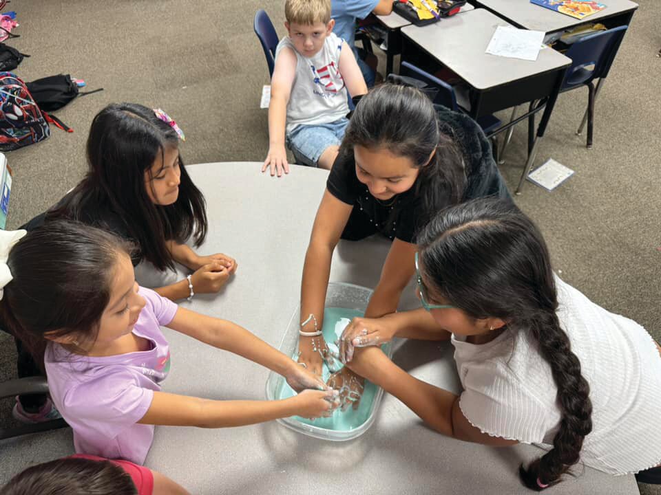 LABELLE -- Upthegrove Elementary School students in AmandaCruz’s class made Oobleck  last week. They have been learning about states of matter. Oobleck can have properties of both a solid and liquid. [Photo courtesy Upthegrove Elementary]